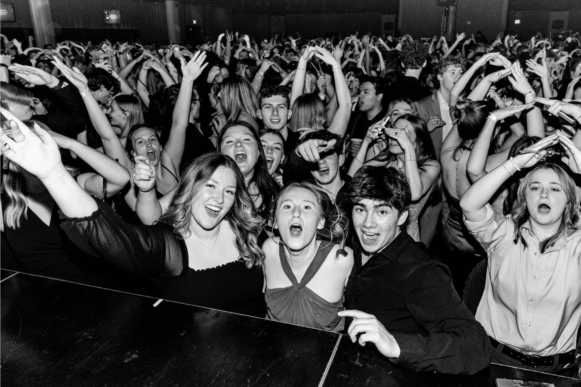 several students dancing and singing during Presidents' Ball